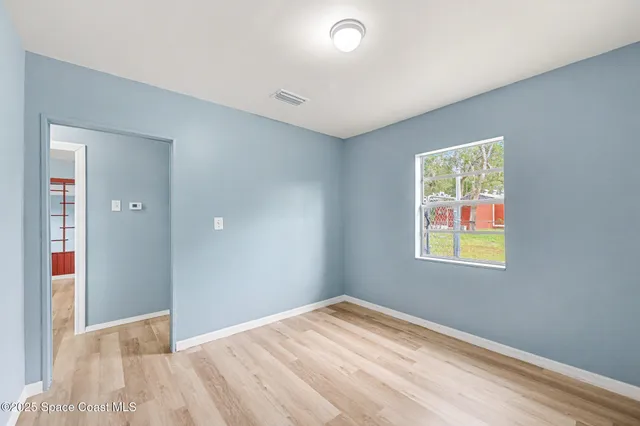 a view of empty room with window