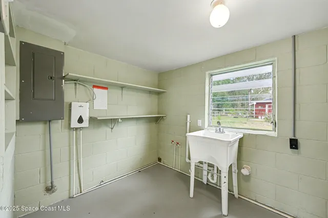 a room with a table and chairs