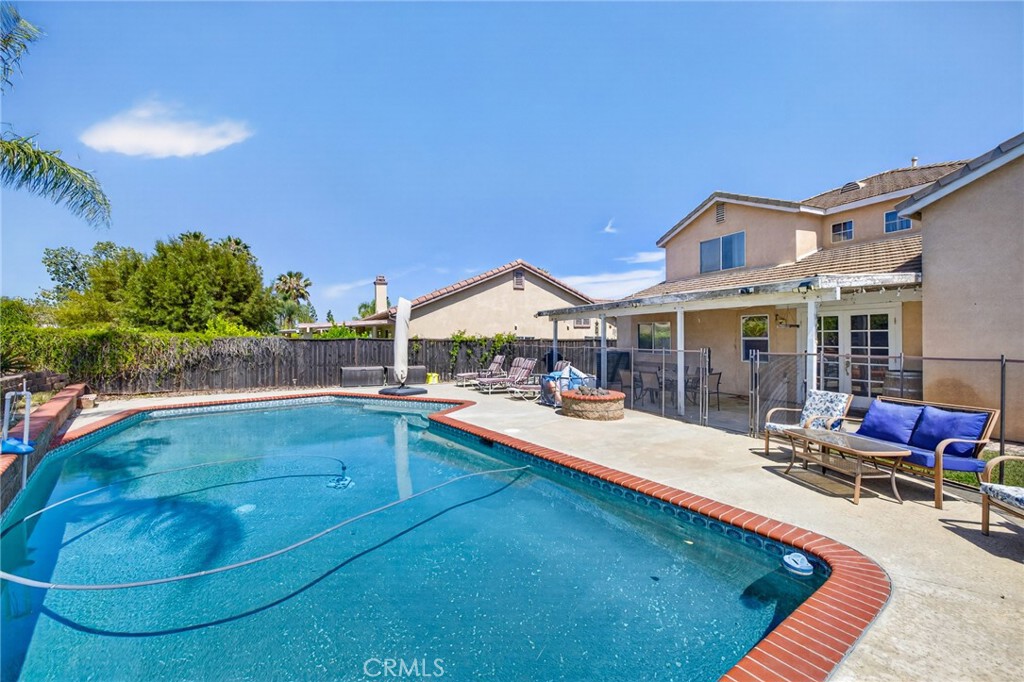 807 Lomond Drive Riverside, CA 92508 - Photo 45 of 47 Pool is unique, deepest in the middle and shallow towards either end for playing pool volleyball.