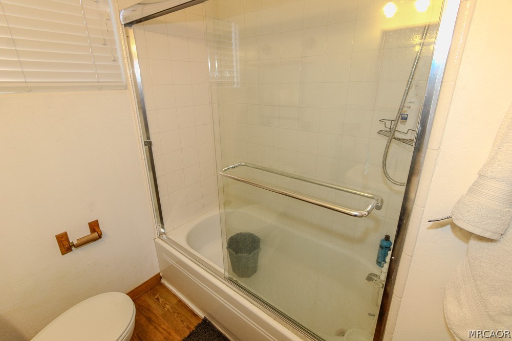 533 Victoria Lane Sugarloaf, CA 92386 - Photo 22 of 36 a bathroom with a granite countertop sink toilet and shower