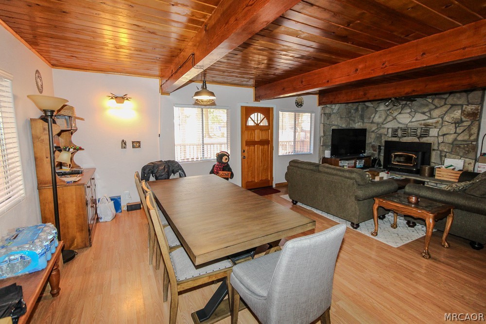 533 Victoria Lane Sugarloaf, CA 92386 - Photo 10 of 36 a view of a dining room with furniture window and wooden floor