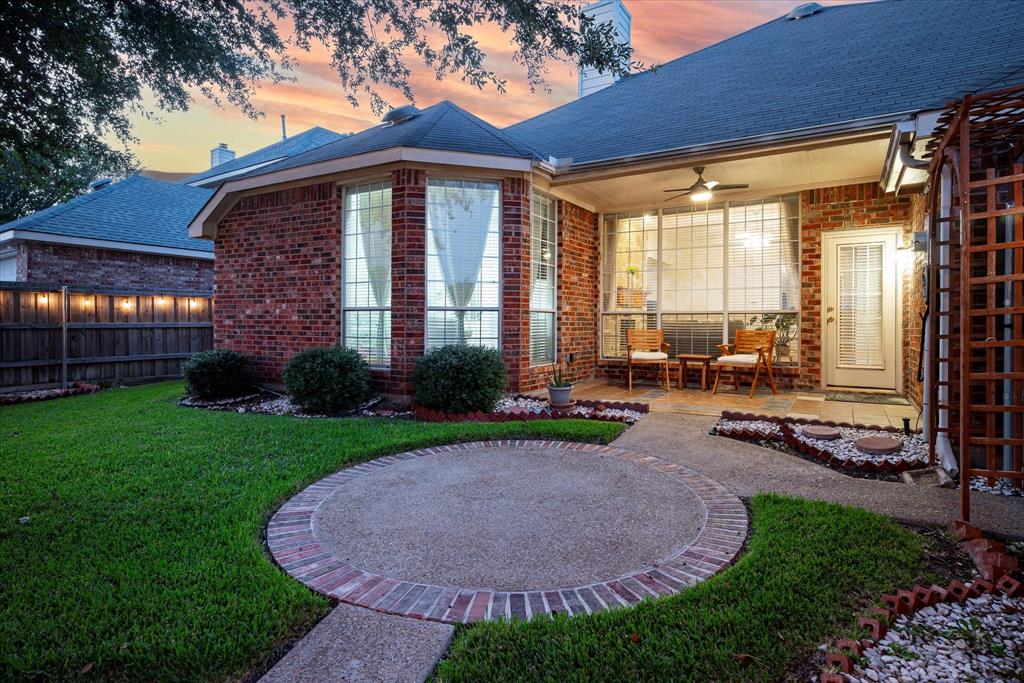 7906 Munich Drive Rowlett, TX 75088 - Photo 25 of 31 a view of a house with a patio