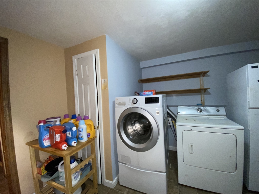 571 Ware Street Mansfield, MA 02048 - Photo 15 of 20 a utility room with dryer and washer