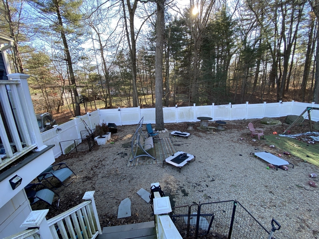 571 Ware Street Mansfield, MA 02048 - Photo 7 of 20 a view of backyard with seating space