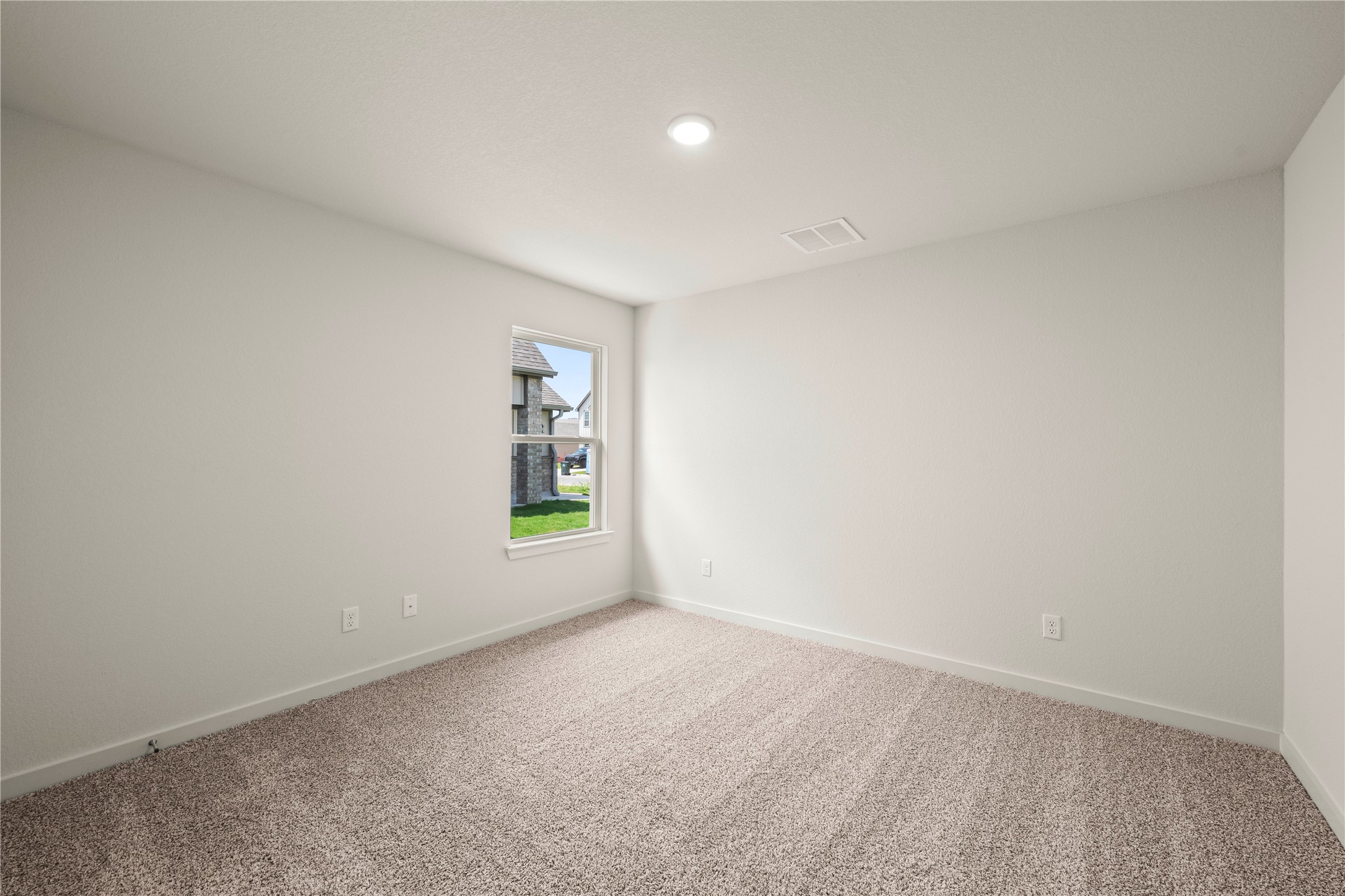 247 Gus Loop Georgetown, TX 78626 - Photo 9 of 17 Soft carpeting underfoot defines this versatile bedroom with a single window framing outdoor views.