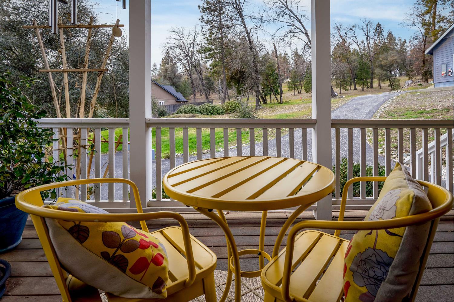 13579 Haas Court Rough and Ready, CA 95975 - Photo 13 of 79 a view of a patio with table and chairs and wooden floor