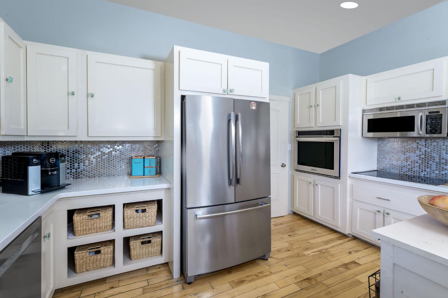 13579 Haas Court Rough and Ready, CA 95975 - Photo 31 of 79 a kitchen with stainless steel appliances a refrigerator stove microwave and sink