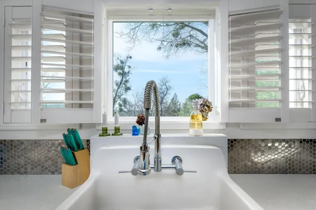 a view of a bedroom with furniture and rug