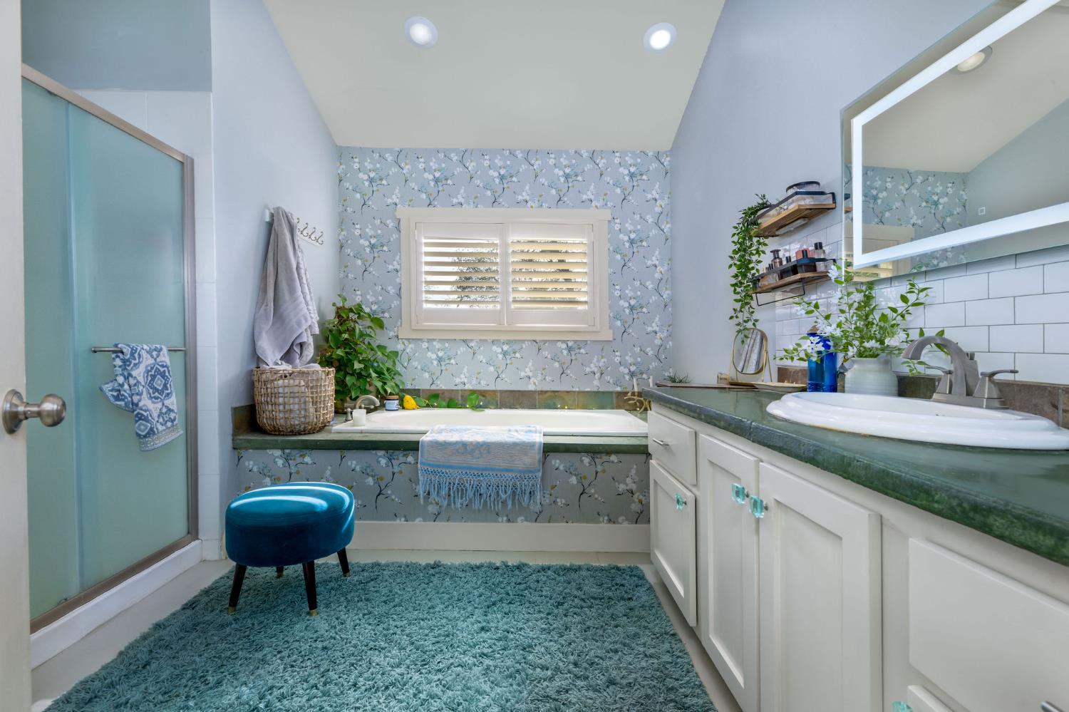 13579 Haas Court Rough and Ready, CA 95975 - Photo 36 of 79 a spacious bathroom with a granite countertop sink and a mirror