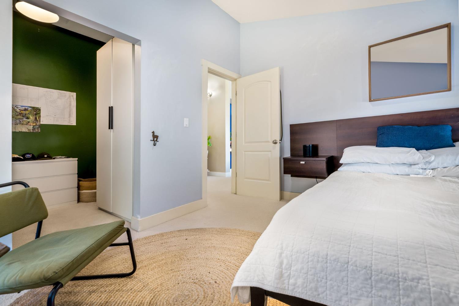 13579 Haas Court Rough and Ready, CA 95975 - Photo 55 of 79 a bedroom with a bed and glass window