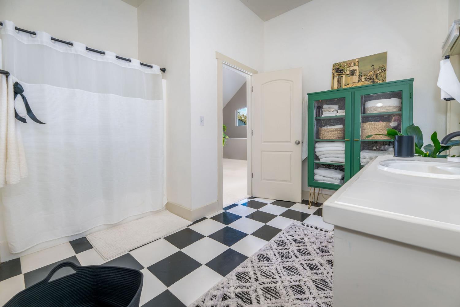 13579 Haas Court Rough and Ready, CA 95975 - Photo 58 of 79 a bathroom with a sink and a shower