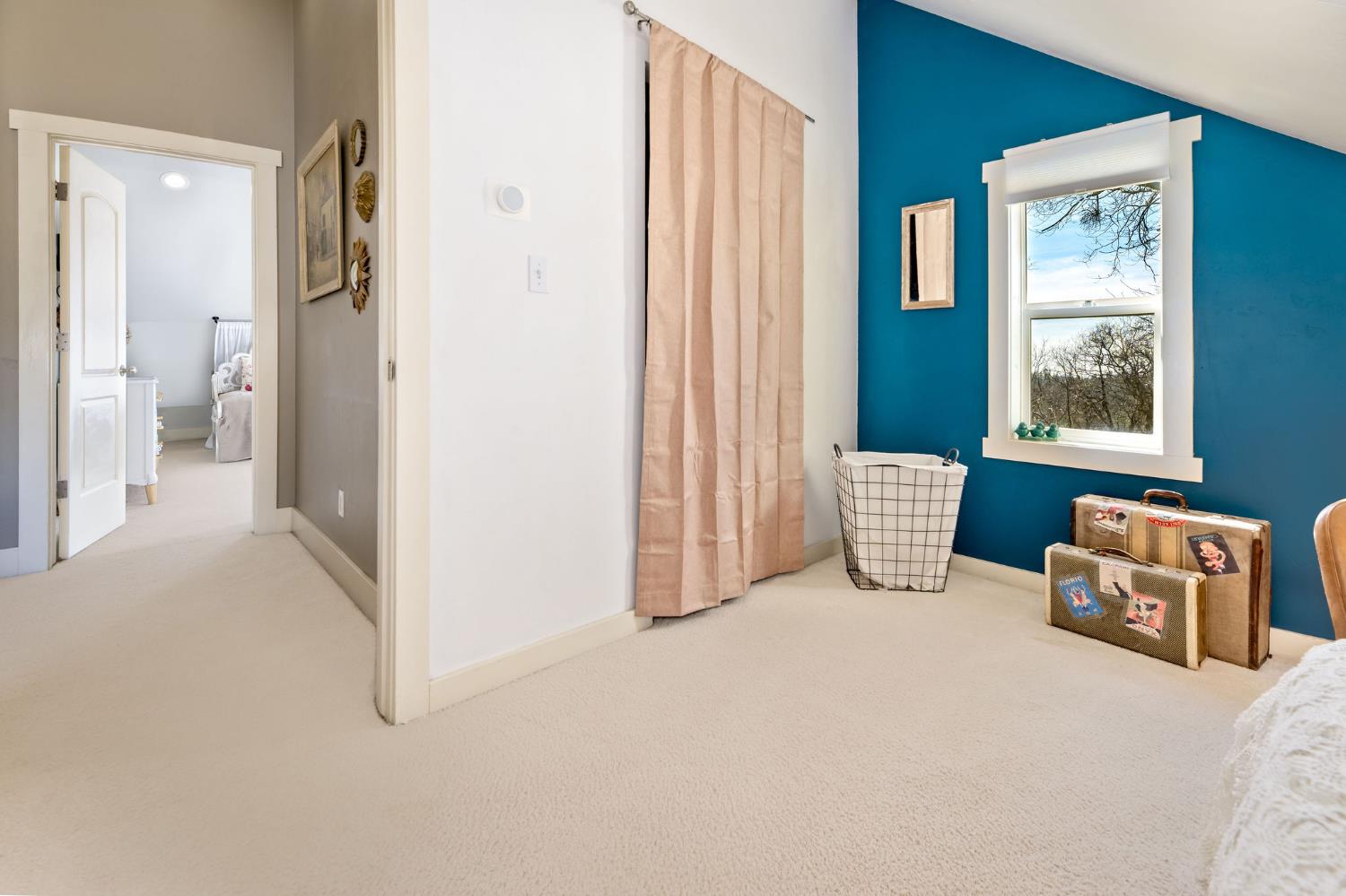 13579 Haas Court Rough and Ready, CA 95975 - Photo 61 of 79 a bed room with a bed and a window