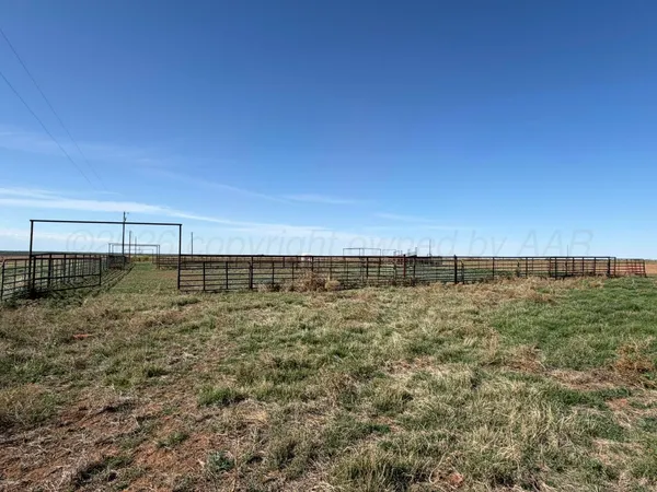a view of a field with an outdoor space