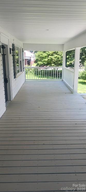 105 North Inman Avenue Bessemer City, NC 28016 - Photo 21 of 38 a view of a porch with wooden floor