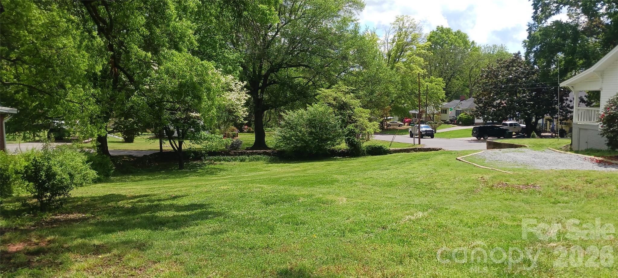 105 North Inman Avenue Bessemer City, NC 28016 - Photo 24 of 38 a view of a backyard with a garden