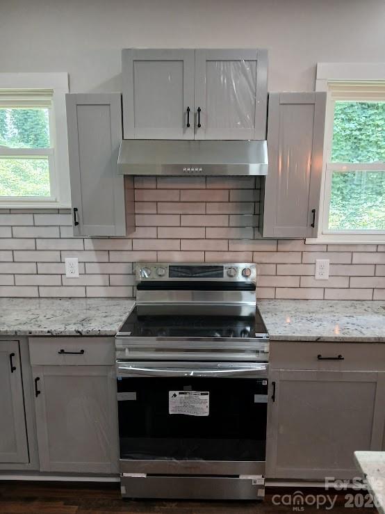 105 North Inman Avenue Bessemer City, NC 28016 - Photo 28 of 38 a stove top oven sitting inside of a kitchen