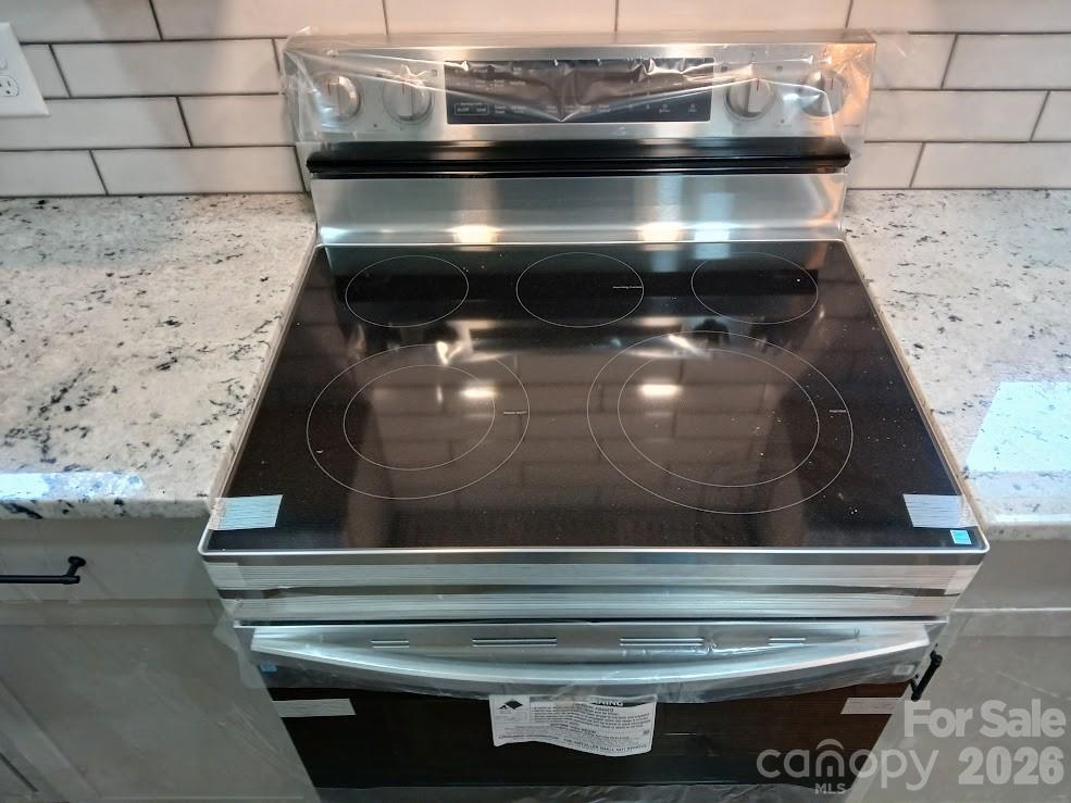 105 North Inman Avenue Bessemer City, NC 28016 - Photo 31 of 38 a close view of stove