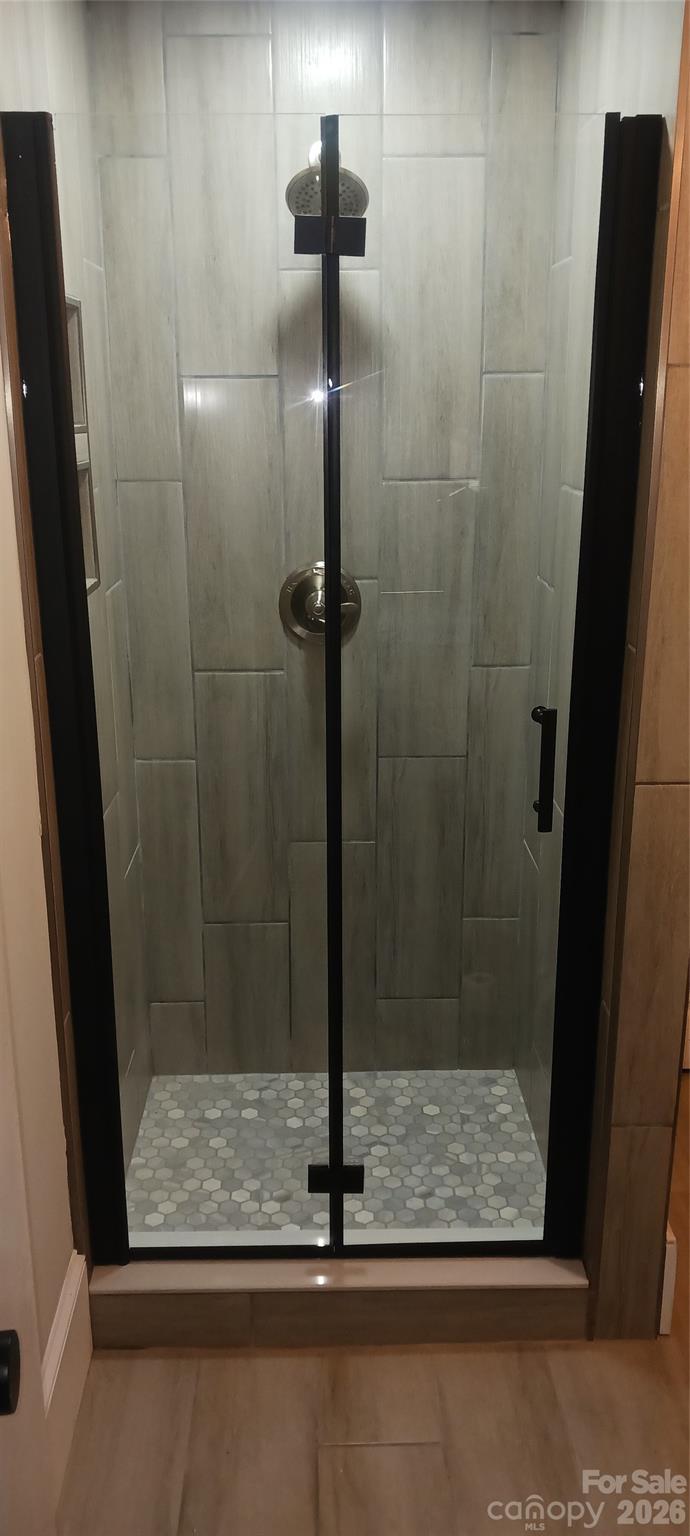 105 North Inman Avenue Bessemer City, NC 28016 - Photo 33 of 38 a bathroom with a shower