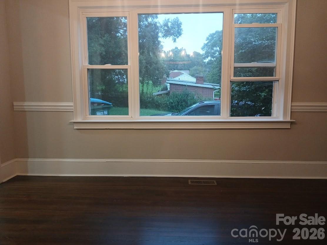 105 North Inman Avenue Bessemer City, NC 28016 - Photo 9 of 38 a view of a black and white floor to ceiling window
