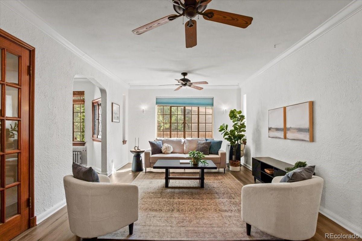 1575 Fillmore Street, Unit 6 Denver, CO 80206 - Photo 2 of 15 a living room with furniture and a window