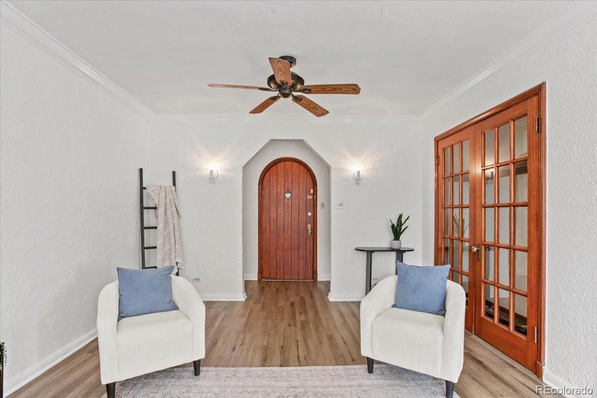 1575 Fillmore Street, Unit 6 Denver, CO 80206 - Photo 6 of 15 a living room with furniture and wooden floor