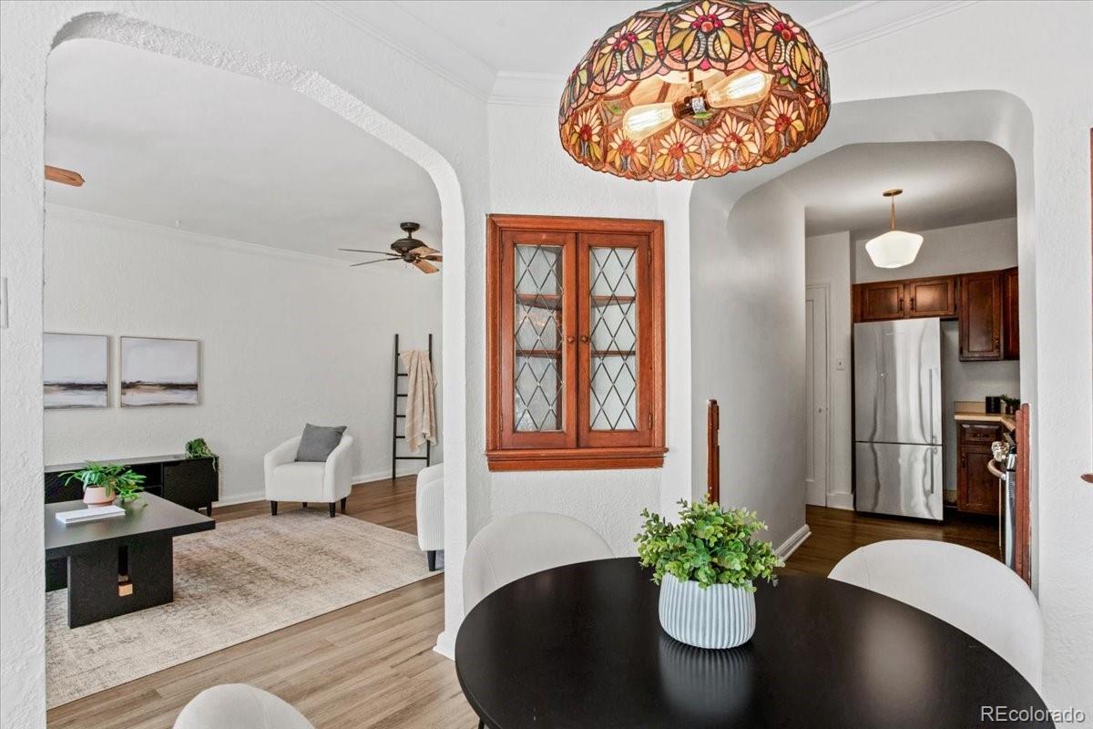 1575 Fillmore Street, Unit 6 Denver, CO 80206 - Photo 8 of 15 a dining room with furniture and wooden floor