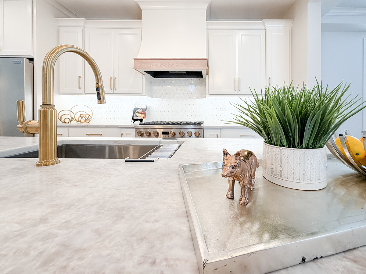 885 Geneva Road St. Charles, IL 60174 - Photo 11 of 39 a kitchen with a stove a faucet and cabinetry