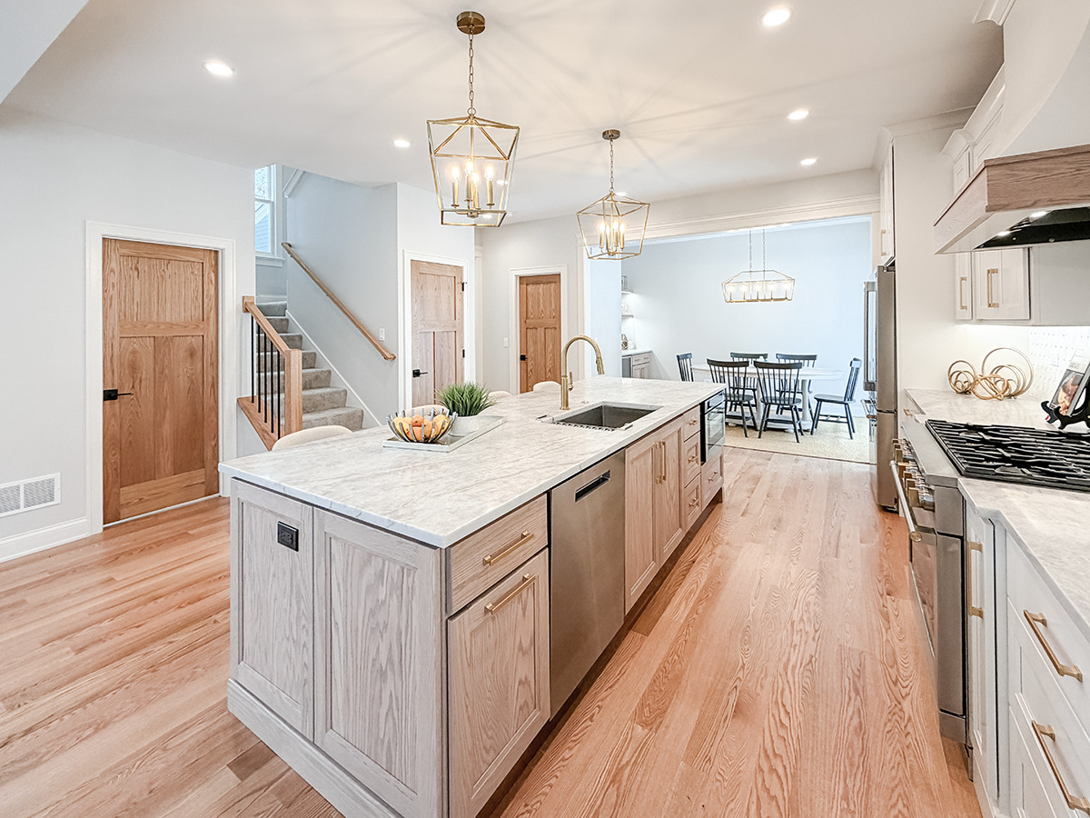 885 Geneva Road St. Charles, IL 60174 - Photo 13 of 39 a open kitchen with stainless steel appliances granite countertop a lot of counter space and wooden floors
