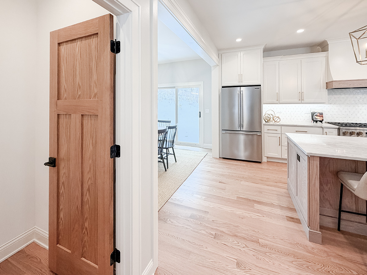 885 Geneva Road St. Charles, IL 60174 - Photo 14 of 39 a kitchen with a refrigerator a sink and cabinets