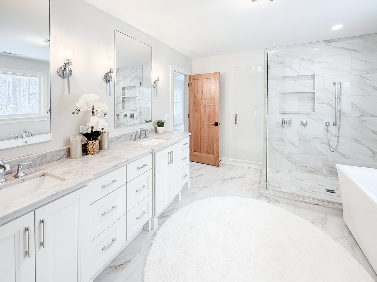 885 Geneva Road St. Charles, IL 60174 - Photo 26 of 39 a spacious bathroom with double sink a toilet a large mirror and shower
