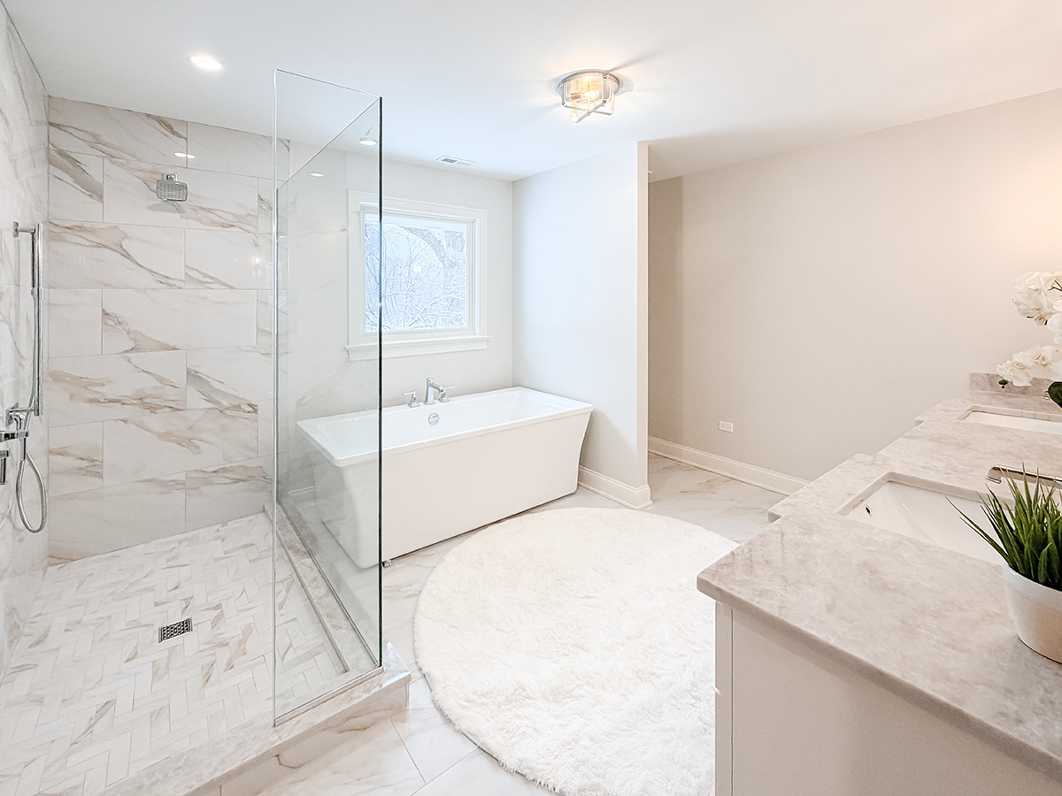 885 Geneva Road St. Charles, IL 60174 - Photo 28 of 39 a bathroom with a tub sink and shower