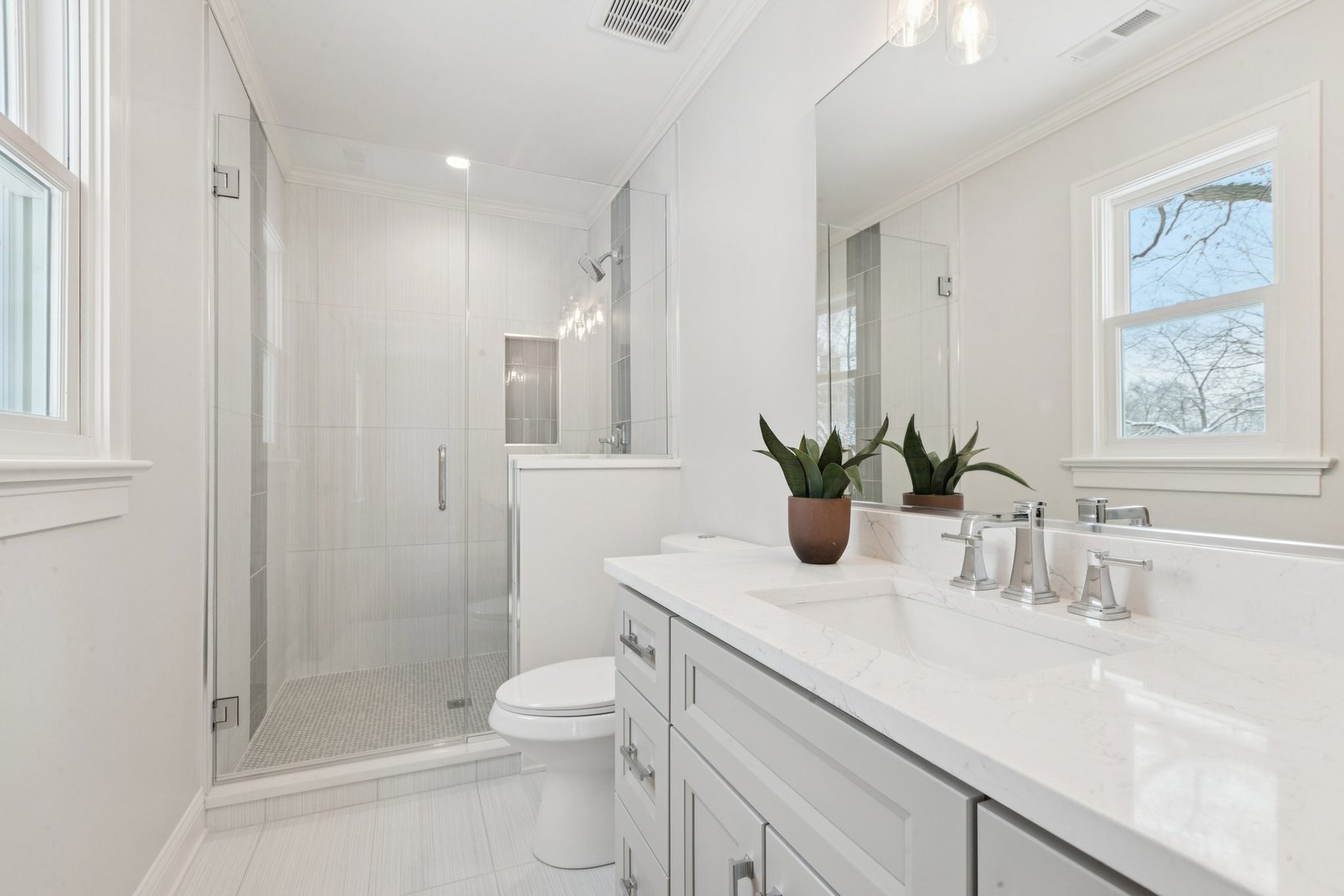 885 Geneva Road St. Charles, IL 60174 - Photo 32 of 39 a bathroom with a toilet a sink and shower