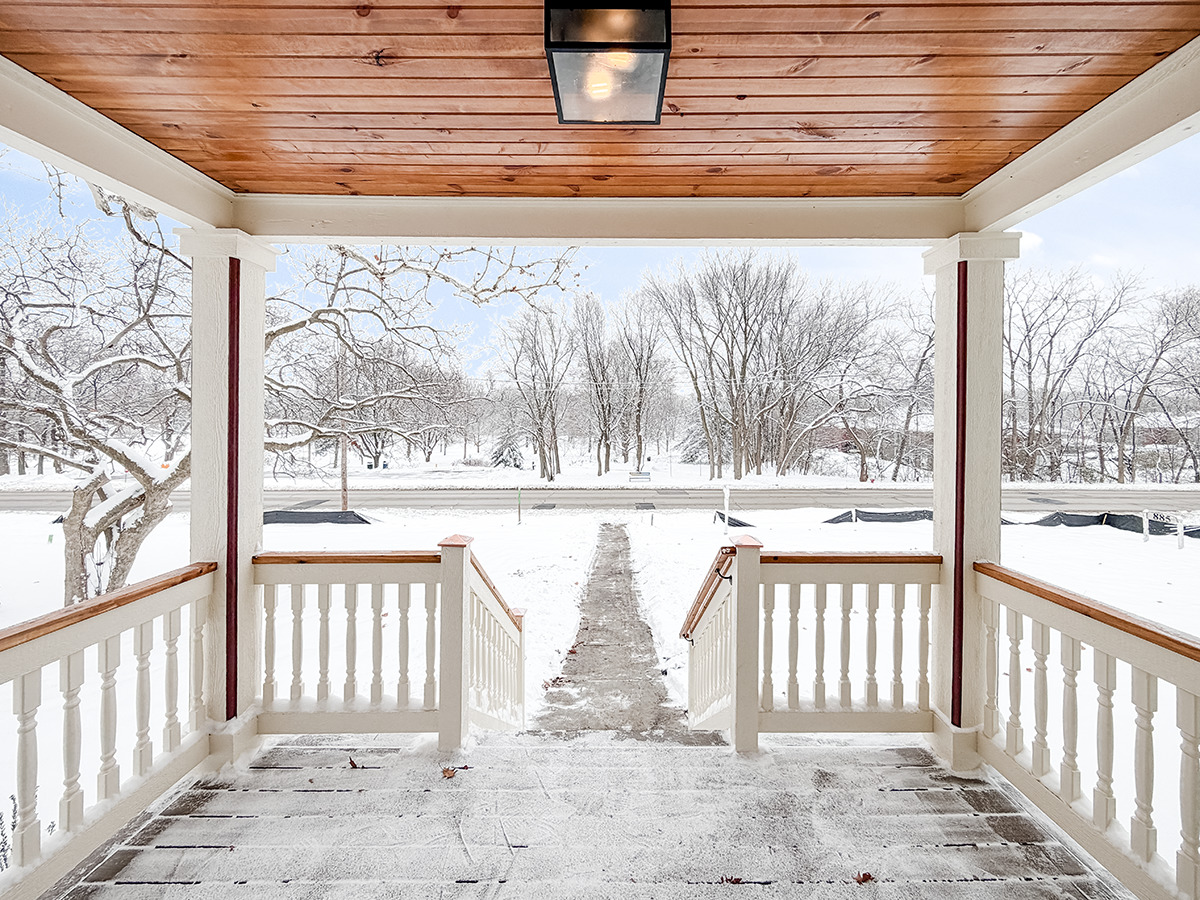 885 Geneva Road St. Charles, IL 60174 - Photo 4 of 39 a view of a porch with a bench