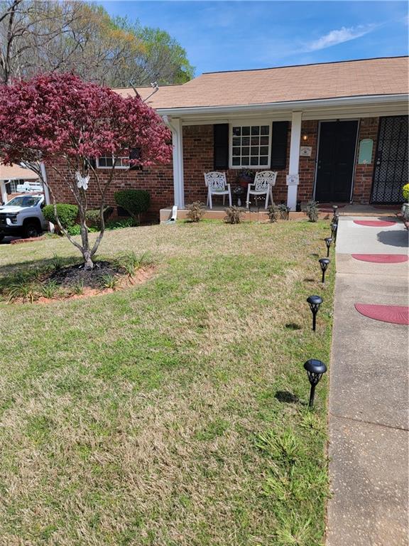 140 Mt Zion Road Southeast, Unit 32 Atlanta, GA 30354 - Photo 1 of 1 a view of house with yard
