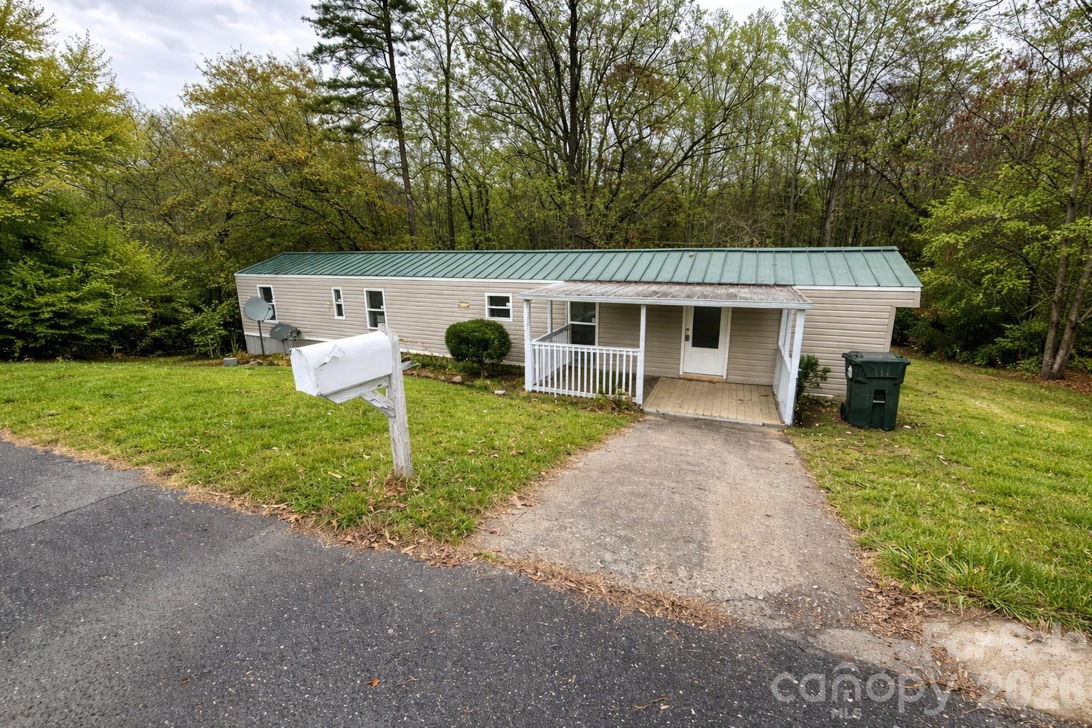 111 Cloverleaf Drive Clover, SC 29710 - Photo 1 of 13 a front view of a house with a yard and garage