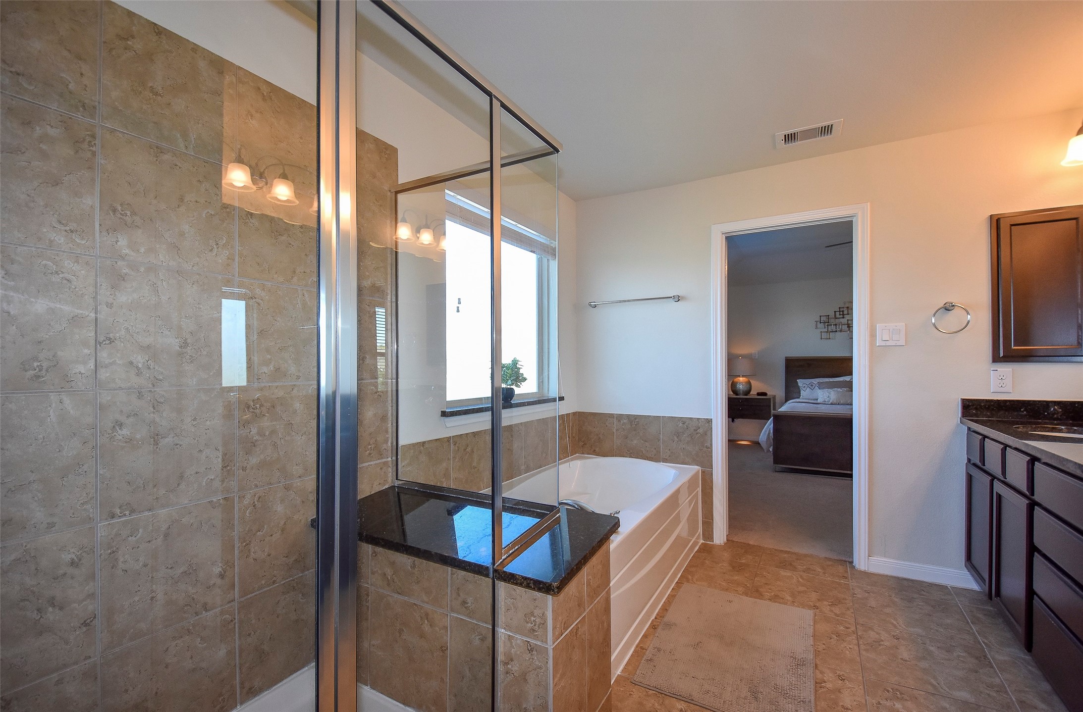 6427 Addlestone Ridge Lane Katy, TX 77494 - Photo 22 of 32 Primary bath with oversized shower and built-in bench.