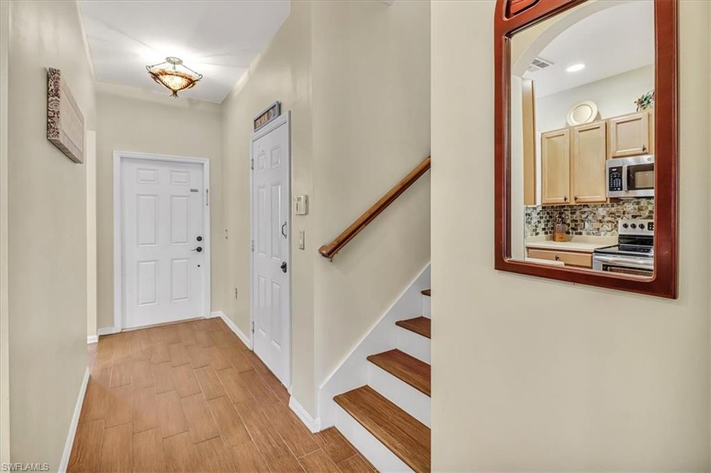 14130 Winchester Court, Unit 1503 Naples, FL 34114 - Photo 13 of 39 Foyer with light wood-type flooring