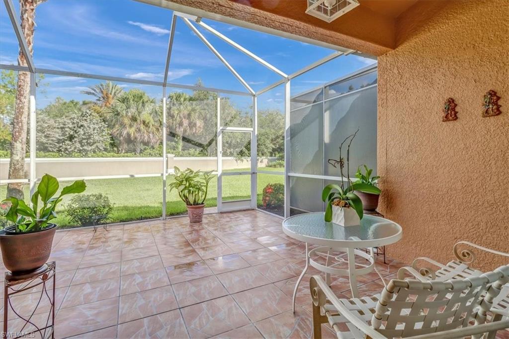 14130 Winchester Court, Unit 1503 Naples, FL 34114 - Photo 18 of 39 View of sunroom / solarium