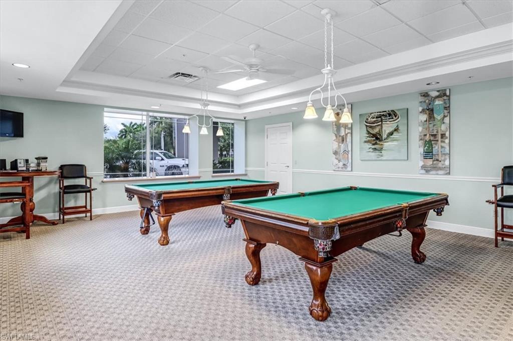 14130 Winchester Court, Unit 1503 Naples, FL 34114 - Photo 30 of 39 Recreation room featuring carpet flooring, billiards, ceiling fan, and a raised ceiling
