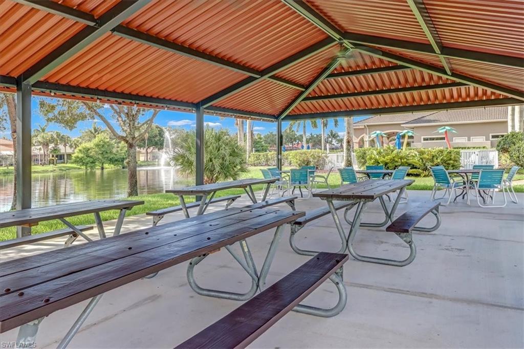 14130 Winchester Court, Unit 1503 Naples, FL 34114 - Photo 33 of 39 View of terrace featuring a water view