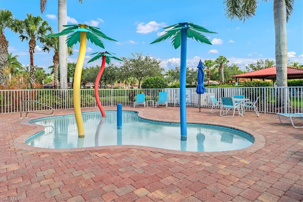 14130 Winchester Court, Unit 1503 Naples, FL 34114 - Photo 34 of 39 View of swimming pool with a patio