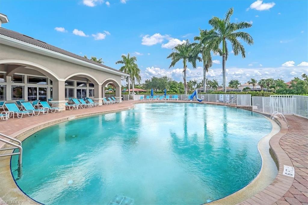 14130 Winchester Court, Unit 1503 Naples, FL 34114 - Photo 36 of 39 View of swimming pool featuring a patio area