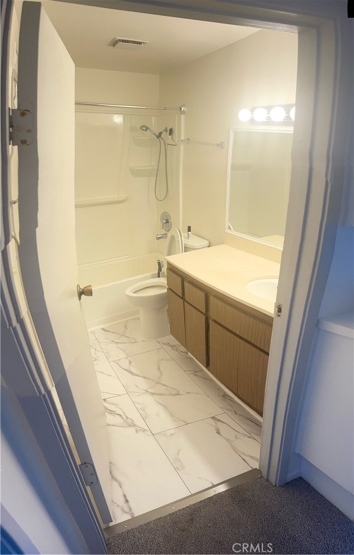 44 Briarwood Irvine, CA 92604 - Photo 11 of 16 a bathroom with a bathtub and a shower