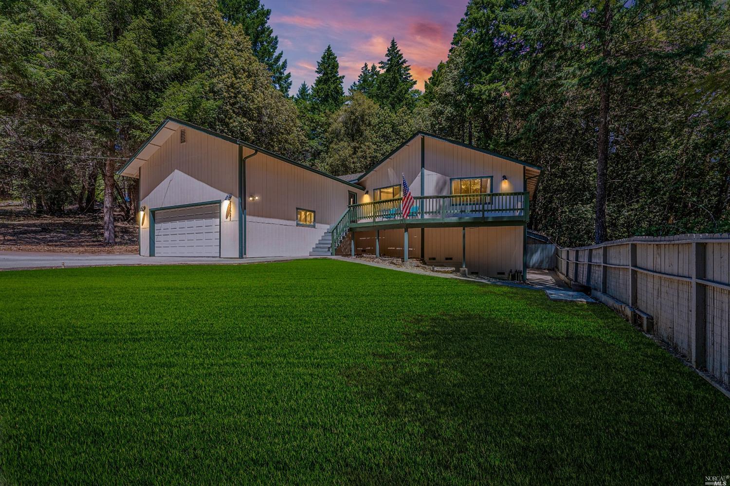 23521 Ridge Road Willits, CA 95490 - Photo 1 of 1 a front view of house with yard and green space