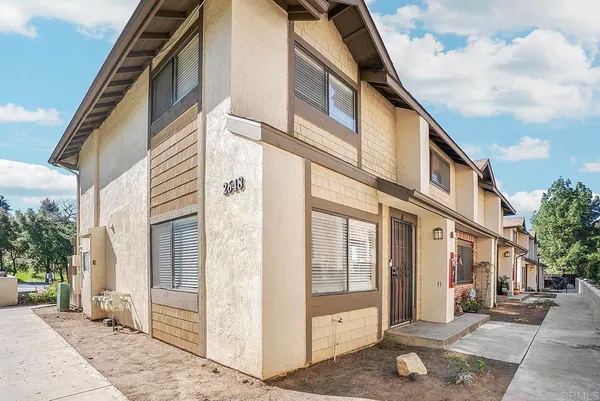 a view of a building along the street