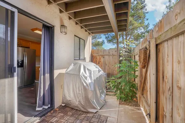 a view of a porch with seating space
