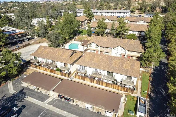 an aerial view of a house with a outdoor space