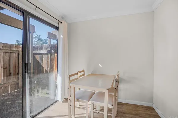 a view of a room that has a glass door and shower