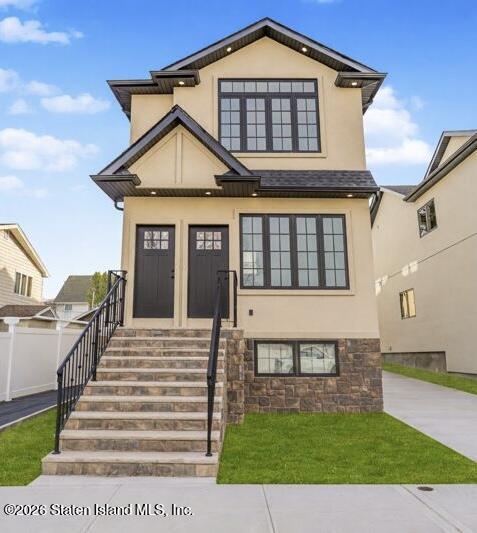 907 Rathbun Avenue Staten Island, NY 10309 - Photo 3 of 36 a front view of a house with a yard