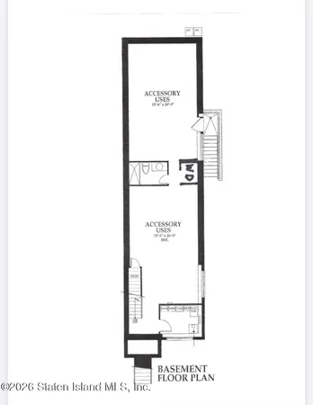 a picture of a bench in front of a wall